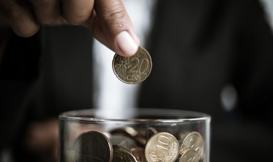Businessman GIving Money Donation Charity Concept